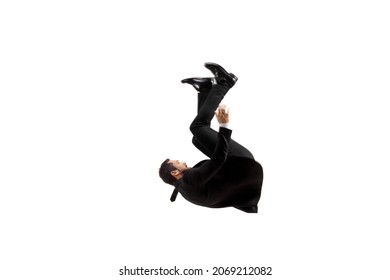 Man In A Black Suit Falling On The Ground Isolated On White Background