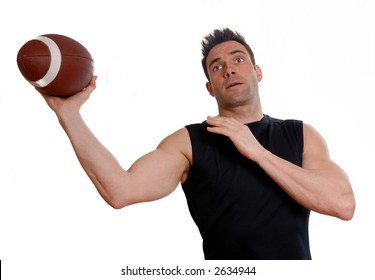 Man In Black Top Throwing A Football