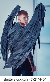 The Man With The Black Wings Of A Fallen Angel