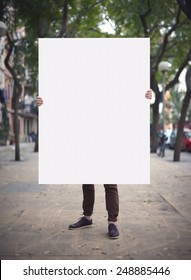 Man With Blank Poster On A Street