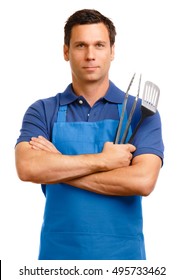 Man In Blue Bbq Apron With Barbecue Grilling Cooking Utensils Isolated On White Background