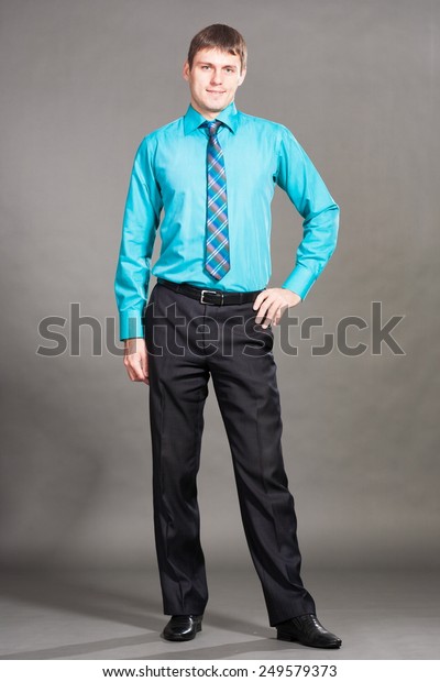 gray slacks blue shirt