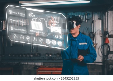 A man in a blue uniform uses VR to interact with a holographic interface displaying eco-friendly energy and battery charging systems.