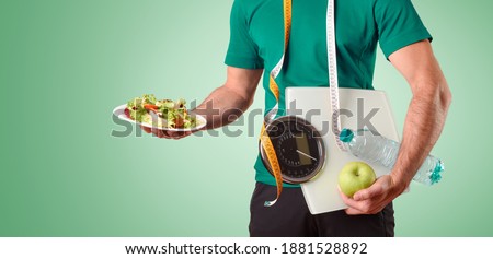 Man body dressed in sportswear with meter scale and water and salad plate on green isolated gradient background