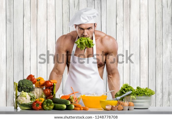 Man Bodybuilder On Kitchen White Toque Stock Photo Edit Now