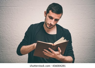 Similar Images, Stock Photos & Vectors of A young black man reading the ...