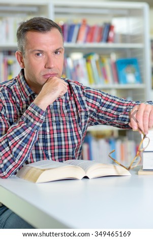 man with book