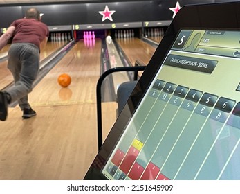 A Man Bowling In Bowling Alley