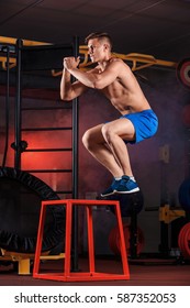 Man Box Jumping At A Crossfit Style Gym.