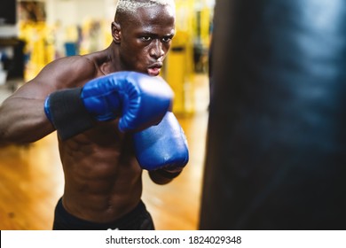 Man Boxer Training Hard - Young Black Guy Boxing In Sport Gym Center Club - Health Fitness And Sporty Activity Concept