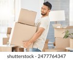 Man, boxes and house moving for property, walking with struggle or heavy cargo in apartment. Male person, carrying and cardboard container in home for real estate, difficult relocation for investment