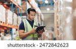 Man, boxes and scanner with tablet in logistics, e commerce or inventory of order or courier solution. Serious industrial worker with digital software for price check, information or package schedule