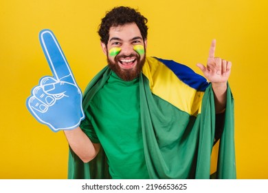 Man, Brazilian, Bearded, Soccer Fan From Brazil, Using Foam Finger Doing Dance Choreography For Team Victory, Goal.