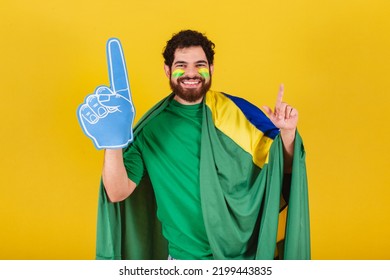 Man, Brazilian, Bearded, Soccer Fan From Brazil, Using Foam Finger Doing Dance Choreography For Team Victory, Goal.