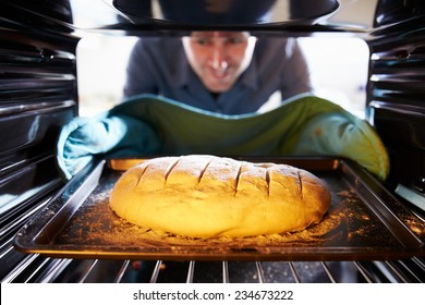 Man Bread Into Oven To Bake