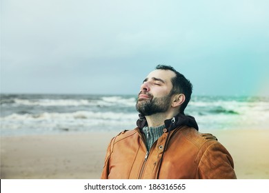 Man Breathing Free On The Beach