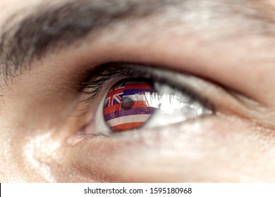 Man With Brown Eye In Close Up, The Flag Of Hawai State In Iris, United States Of America With Wind Motion. Video Concept