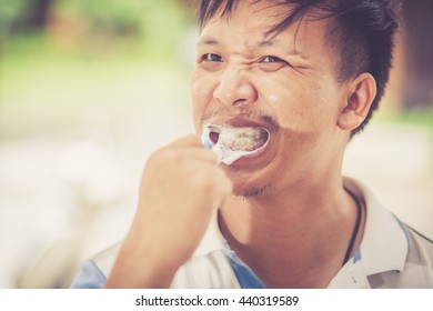 Man Brushing Teeth