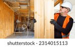 Man builder. Construction company worker with boards. Guy carries boards for manufacture parquet. Use lumber for construction. Man in builder uniform and hardhat. Contractor inside unfinished house