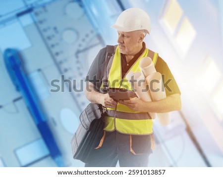 Man builder with electronic tablet. Architectural engineer with paper drawings. Building inspector stands by room plans of apartment. Builder designer in yellow vest. Portrait of man architect