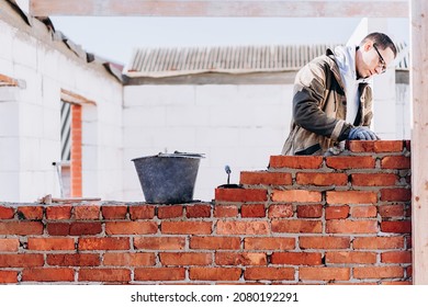 Man Building Brick Wall, Bricklayer