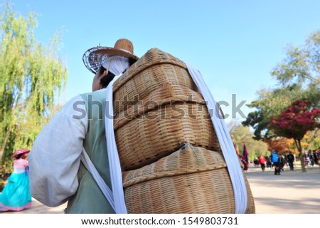 Man with a bundle on his back