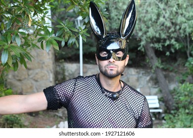 Man With Bunny Mask And See Through Mesh Shirt