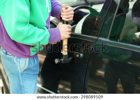 Man burglar stealing car