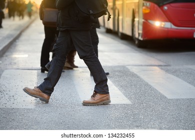 Man, Bus And Zebra Crossing