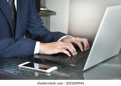 Man In Business Suit Typing Laptop (selective Focus), Technology And Bussiness Concept.