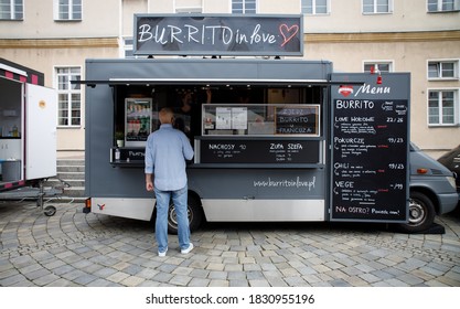 Man Buying Burritos At Food Truck Fair Poland Opole 10.10.2020. Selective Focus 