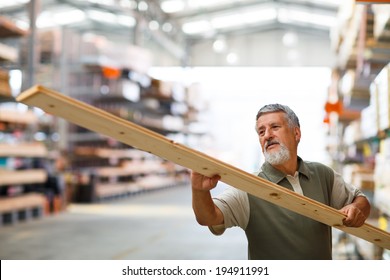 Man Buying Construction Wood In A  DIY Store For His DIY Home Re-modeling Project