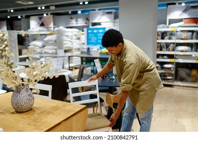 Man Is Buying Folding Chair For Garden