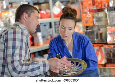 Man Buys Brake Wheel In Auto Parts Store