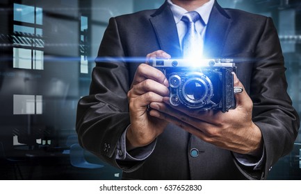 Man with camera in hands
