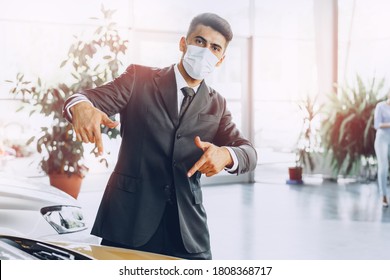 Man Car Dealer Wearing Protective Medical Mask On His Working Place