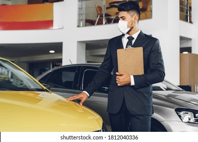 Man Car Dealer Wearing Protective Medical Mask On His Working Place