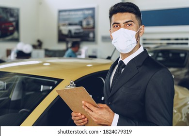 Man Car Dealer Wearing Protective Medical Mask On His Working Place