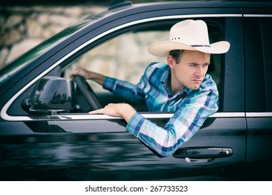 Man In A Car Driving Backwards