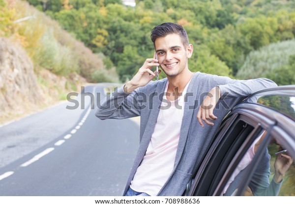 man in the car with the\
mobile phone