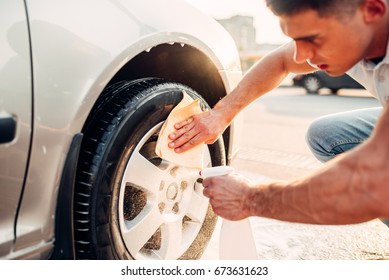 Man With Car Rims Cleaner, Carwash