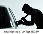 Man, car and steal attempt with criminal, automobile and flash light or checking for valuable possession inside. Illicit, assessing vehicle and security for anti theft system, hooded and parking lot