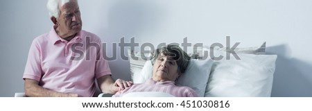 Similar – Female doctor comforting older female patient