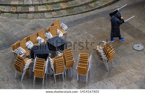 Man Carrying Table Ultiple Tables Chairs Royalty Free Stock Image