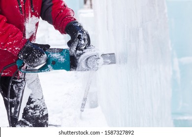 Man Carves Ice Sculpture Electric Saw Close-up