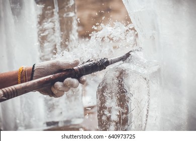 Man Is Carving The Ice Sculpture For Wedding