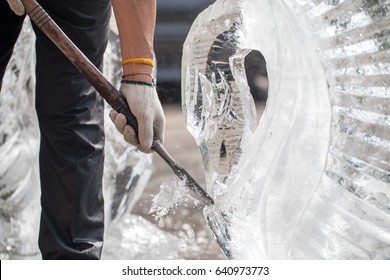 Man Is Carving The Ice Sculpture For Wedding