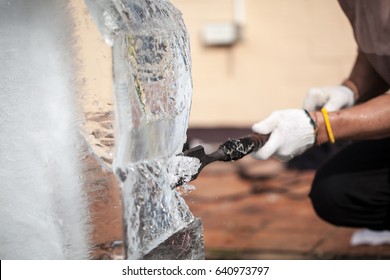 Man Is Carving The Ice Sculpture For Wedding