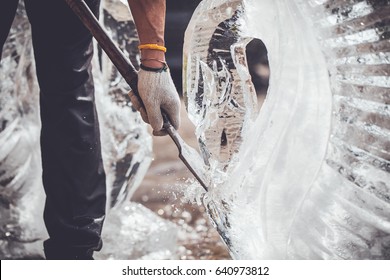 Man Is Carving The Ice Sculpture For Wedding