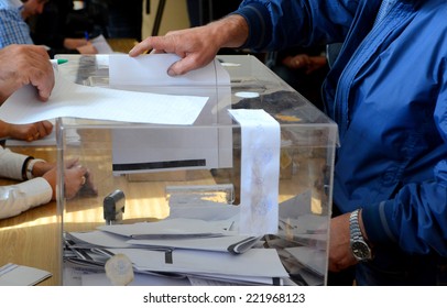 A Man Casts His Vote At A Polling Station In Sofia October 5, 2014. Bulgaria 